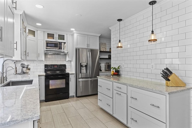108 Oak Pointe Dr, Monroeville, PA 15146 - kitchen featuring stainless steel appliances, tasteful backsplash, white cabinetry, decorative light fixtures, and light stone countertops