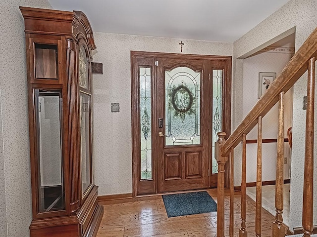 141 Clover Ln, Pine Twp, PA 15044 - foyer entrance featuring light wood-style flooring, wallpapered walls, and stairway
