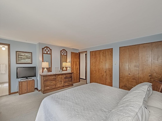 141 Clover Ln, Pine Twp, PA 15044 - bedroom featuring light carpet and two closets