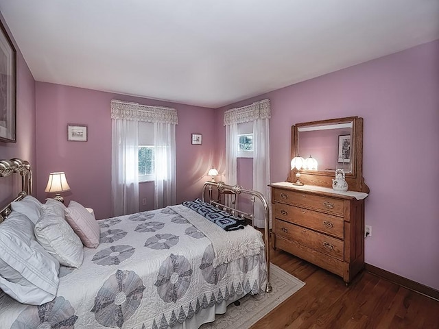 141 Clover Ln, Pine Twp, PA 15044 - bedroom with multiple windows and dark wood-type flooring
