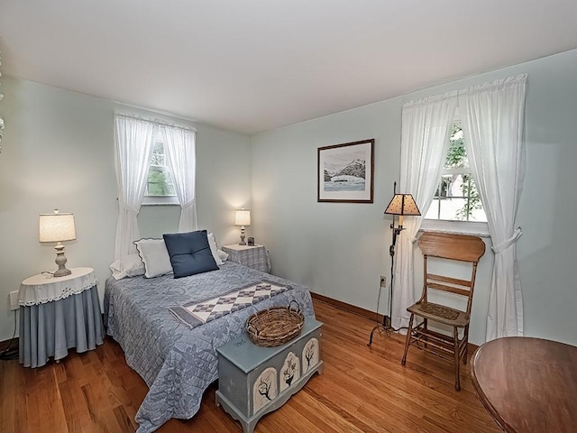 141 Clover Ln, Pine Twp, PA 15044 - bedroom with multiple windows and light wood-style floors