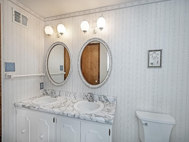 141 Clover Ln, Pine Twp, PA 15044 - bathroom with wallpapered walls and double vanity