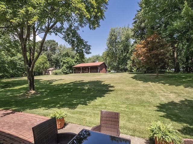 141 Clover Ln, Pine Twp, PA 15044 - view of grassy yard with a patio area