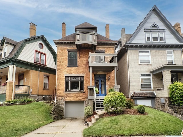 410 Bailey Ave, Mt Washington, PA 15211 - view of front facade with a balcony, an attached garage, concrete driveway, brick siding, and a front yard