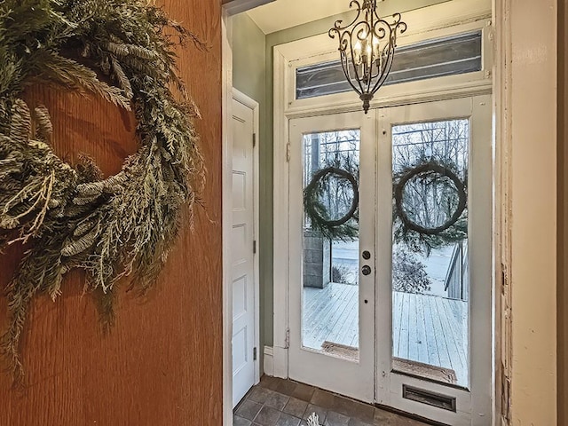 410 Bailey Ave, Mt Washington, PA 15211 - foyer entrance featuring a chandelier and dark stone finish floors