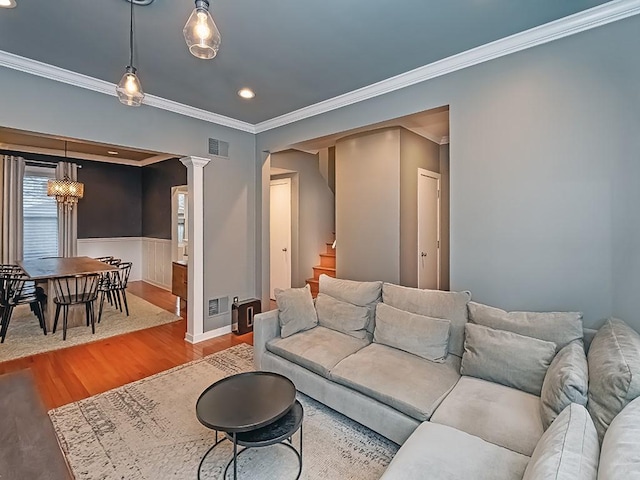 410 Bailey Ave, Mt Washington, PA 15211 - living room with wood finished floors, stairs, a chandelier, recessed lighting, and crown molding