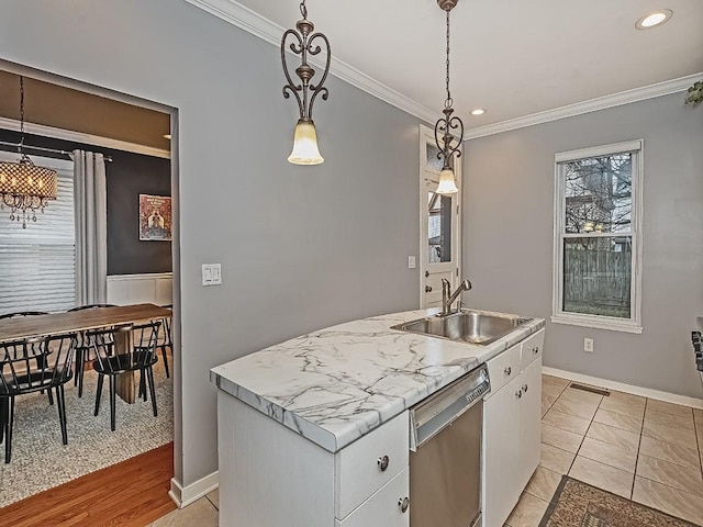 410 Bailey Ave, Mt Washington, PA 15211 - kitchen with stainless steel dishwasher, crown molding, white cabinets, light countertops, and recessed lighting