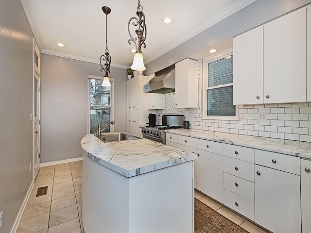 410 Bailey Ave, Mt Washington, PA 15211 - kitchen with wall chimney range hood, high end stove, backsplash, crown molding, and a kitchen island with sink