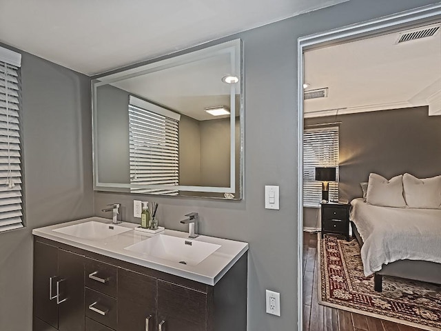 410 Bailey Ave, Mt Washington, PA 15211 - full bathroom with double vanity and wood finished floors