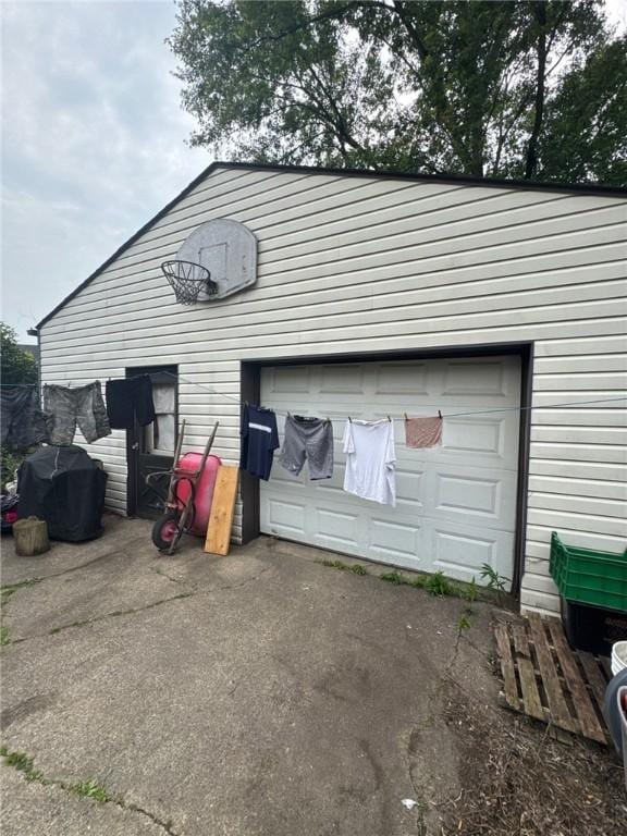 534 Independence Dr, Clairton, PA 15025 - garage featuring asphalt driveway