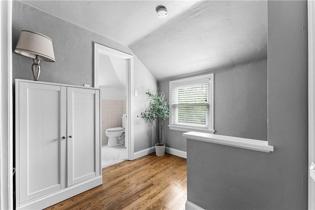 1155 Cedar Blvd, Mt Lebanon, PA 15228 - bathroom with lofted ceiling and wood finished floors