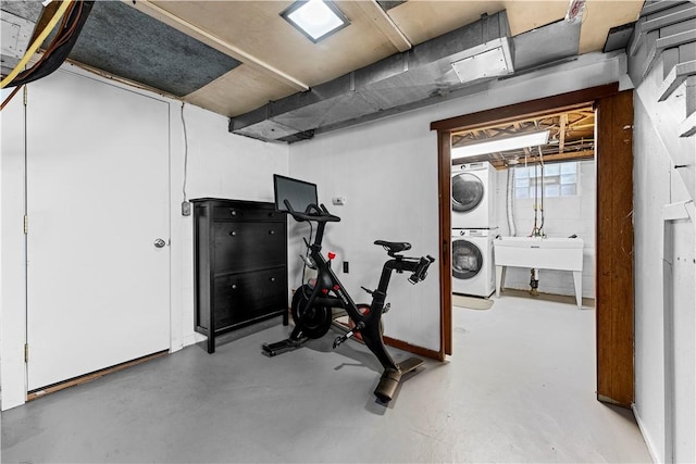 1155 Cedar Blvd, Mt Lebanon, PA 15228 - exercise room featuring stacked washer / drying machine and a sink