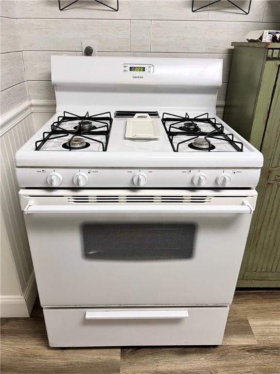 1220 Negley St, Farrell, PA 16121 - kitchen view of gas range gas stove and wood finished floors