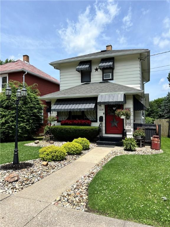 1220 Negley St, Farrell, PA 16121 - american foursquare style home with a chimney and a shingled roof