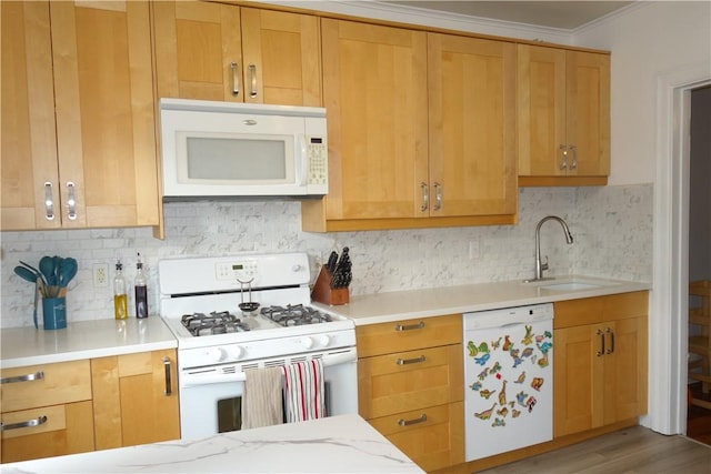 540 Mifflin Ave, Regent Square, PA 15221 - kitchen with white appliances, decorative backsplash, light stone countertops, light wood-type flooring, and ornamental molding