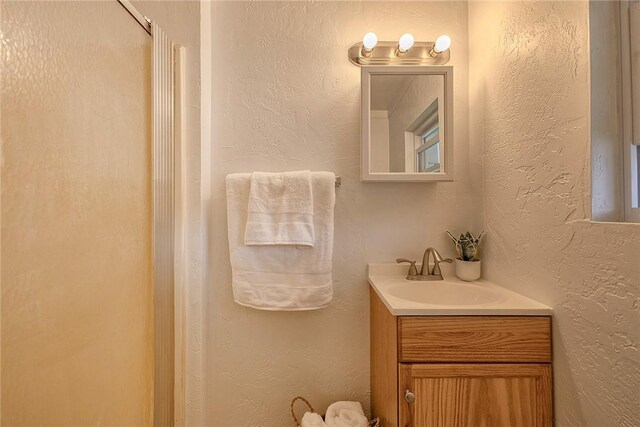 881 Main St, North Huntingdon, PA 15642 - bathroom featuring vanity and a shower