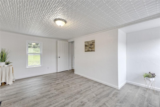 881 Main St, North Huntingdon, PA 15642 - unfurnished room featuring wood finished floors and baseboards