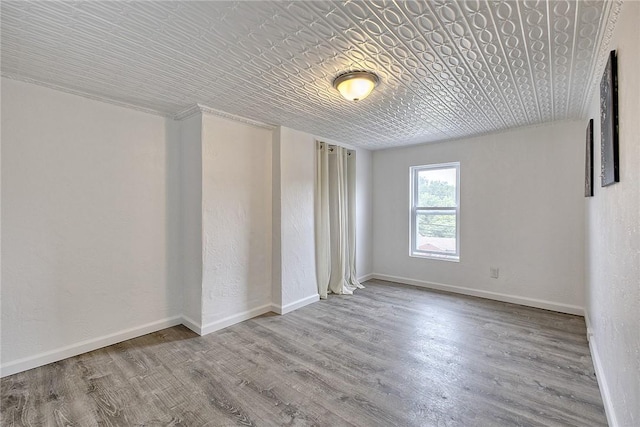 881 Main St, North Huntingdon, PA 15642 - unfurnished room featuring wood finished floors and baseboards