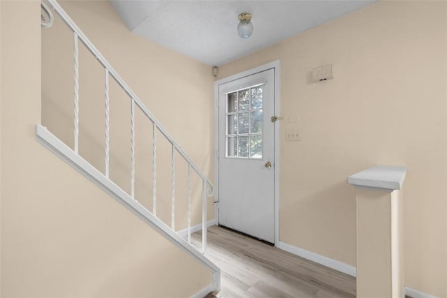 3080 E Bardonner Rd, Hampton, PA 15044 - foyer with wood finished floors and stairs