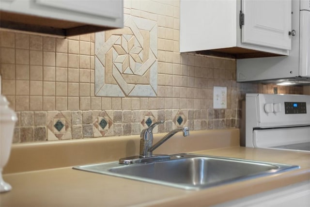 3080 E Bardonner Rd, Hampton, PA 15044 - kitchen view of white cabinets, light countertops, and decorative backsplash