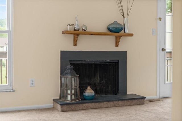 3080 E Bardonner Rd, Hampton, PA 15044 - detailed view of carpet and a fireplace with raised hearth