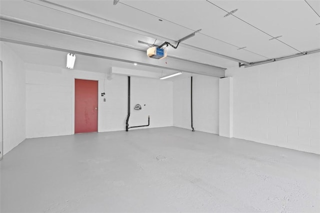 3080 E Bardonner Rd, Hampton, PA 15044 - garage with a garage door opener and concrete block wall