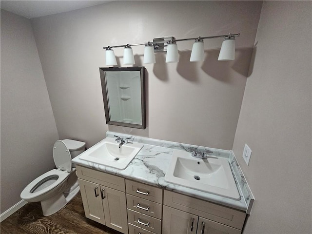 352 Hartzell School Rd, Marion Twp, PA 16123 - bathroom featuring double vanity and wood finished floors