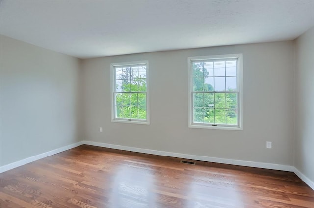 7311 Lafayette Sq, Hopewell Twp, PA 15001 - empty room with wood finished floors