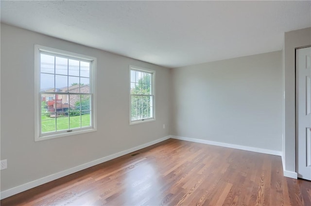 7311 Lafayette Sq, Hopewell Twp, PA 15001 - spare room featuring wood finished floors and baseboards