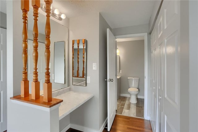 7311 Lafayette Sq, Hopewell Twp, PA 15001 - bathroom with toilet and wood finished floors