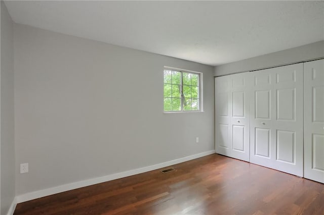 7311 Lafayette Sq, Hopewell Twp, PA 15001 - unfurnished bedroom with wood finished floors and a closet