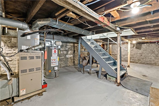 428 Card Ave, Wilmerding, PA 15148 - unfinished below grade area with water heater, stairway, and heating unit