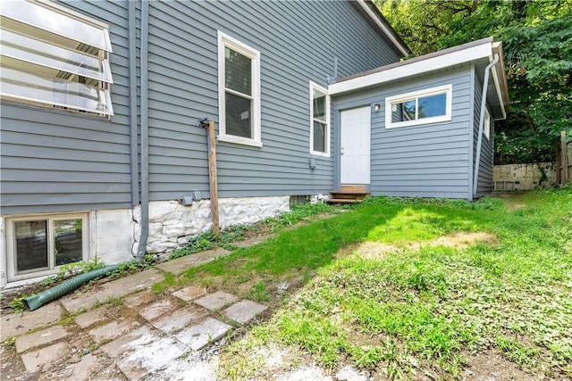 428 Card Ave, Wilmerding, PA 15148 - rear view of property featuring entry steps and a lawn