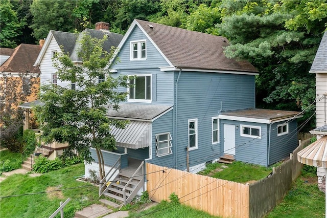 428 Card Ave, Wilmerding, PA 15148 - back of house featuring stairway, a shingled roof, and entry steps