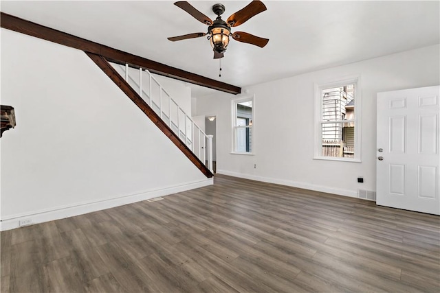 428 Card Ave, Wilmerding, PA 15148 - unfurnished living room featuring ceiling fan, stairway, wood finished floors, and beamed ceiling