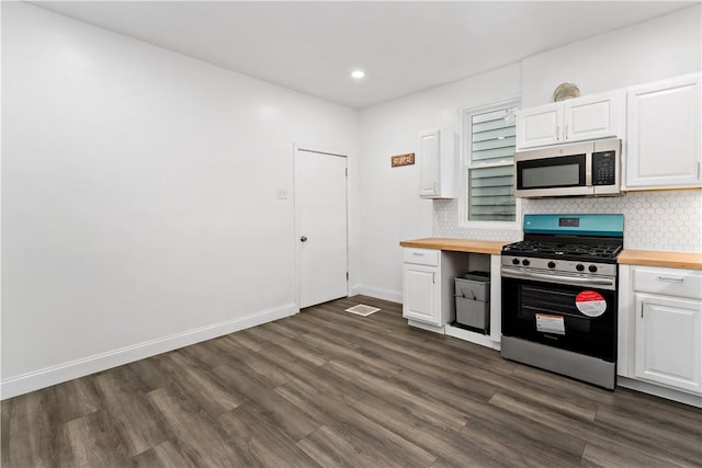428 Card Ave, Wilmerding, PA 15148 - kitchen featuring stainless steel appliances, wood counters, white cabinetry, dark wood-style floors, and decorative backsplash