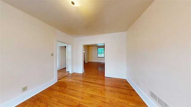 2945 Devlin St, Arlington, PA 15210 - empty room with light wood-style flooring and baseboards