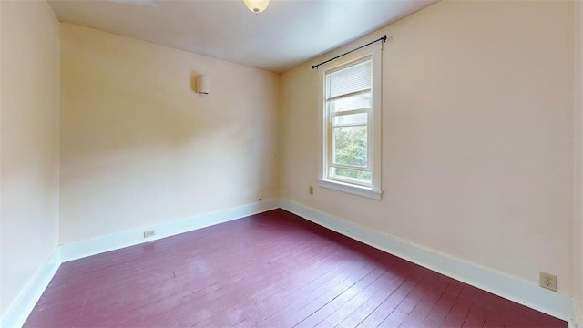 2945 Devlin St, Arlington, PA 15210 - spare room featuring dark wood-type flooring and baseboards