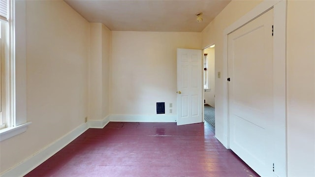 2945 Devlin St, Arlington, PA 15210 - empty room featuring hardwood / wood-style floors and baseboards