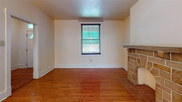 2945 Devlin St, Arlington, PA 15210 - unfurnished living room with wood finished floors