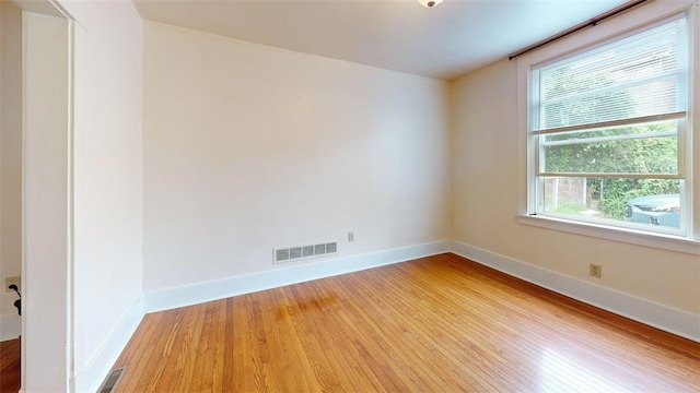 2945 Devlin St, Arlington, PA 15210 - spare room featuring light wood finished floors and baseboards