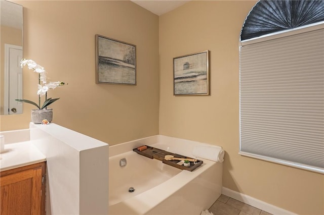 811 Sunset Cir Unit 811, Cranberry Twp, PA 16066 - bathroom featuring vanity, a garden tub, and tile patterned floors