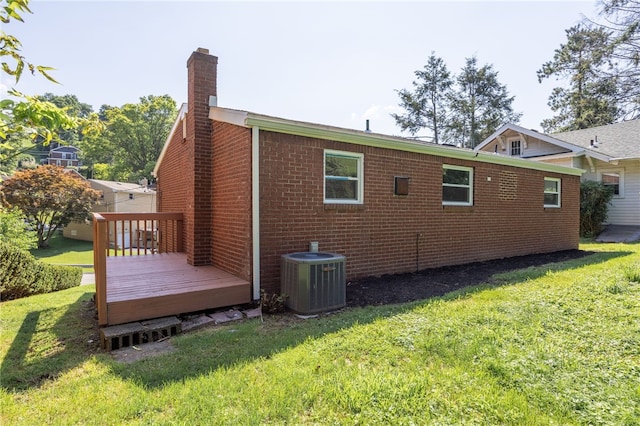 239 Pointview Rd, Brentwood, PA 15227 - view of side of property with a chimney, a wooden deck, and a lawn