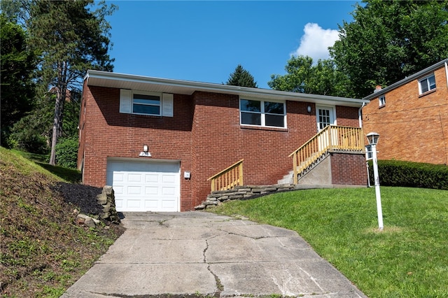 239 Pointview Rd, Brentwood, PA 15227 - view of front facade with a garage, driveway, a front lawn, and brick siding