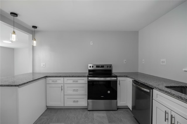 239 Pointview Rd, Brentwood, PA 15227 - kitchen with appliances with stainless steel finishes, a peninsula, and white cabinets