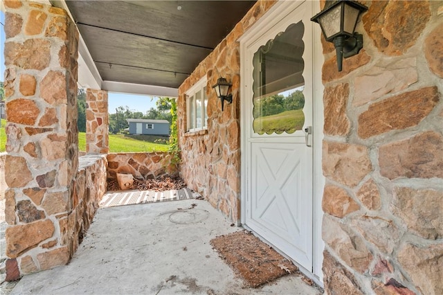 224 E End, Bullskin Twp, PA 15425 - entrance to property featuring stone siding and a porch
