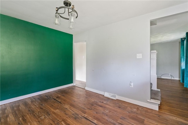224 E End, Bullskin Twp, PA 15425 - empty room featuring a chandelier and wood finished floors