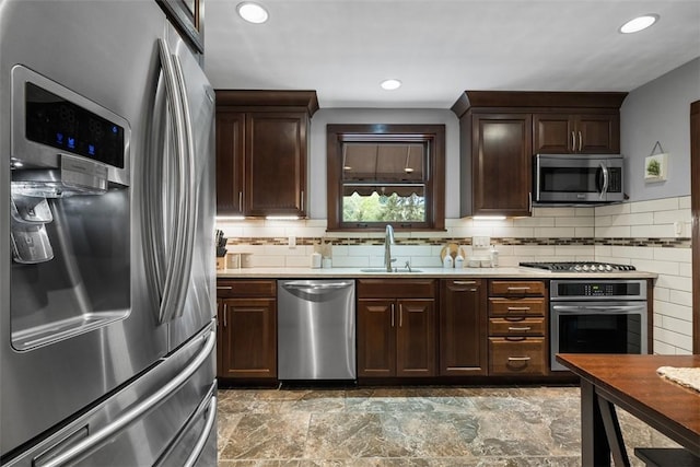5517 Gibson Rd, Richland, PA 15044 - kitchen with stainless steel appliances, dark brown cabinetry, light countertops, and recessed lighting
