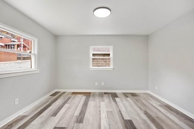 444 27th St, Mckeesport, PA 15132 - empty room featuring wood finished floors and baseboards
