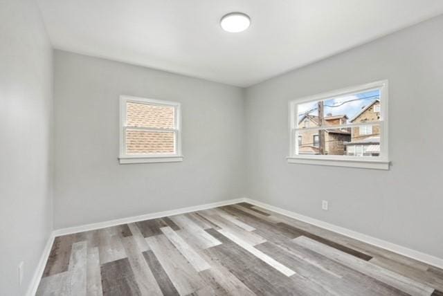 444 27th St, Mckeesport, PA 15132 - spare room with wood finished floors and baseboards